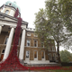 those are poppies...the building they’re “spilling” from is the Imperial War Museum in London